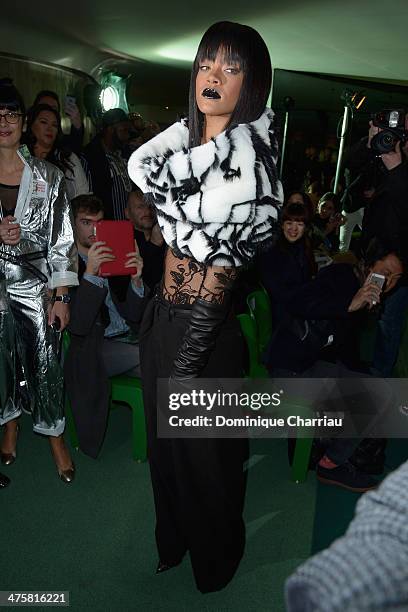 Rihanna attends the Jean Paul Gaultier show as part of the Paris Fashion Week Womenswear Fall/Winter 2014-2015 on March 1, 2014 in Paris, France.