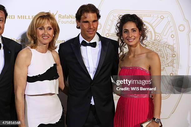 Rafael Nadal with his mother Ana Maria Parera and his fiancee Maria Francisca Perello pose at the 1st Gala of his foundation Fudacion Rafa Nadal on...