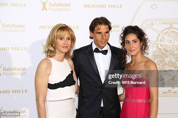 Rafael Nadal with his mother Ana Maria Parera and his fiancee Maria Francisca Perello pose at the 1st Gala of his foundation Fudacion Rafa Nadal on...