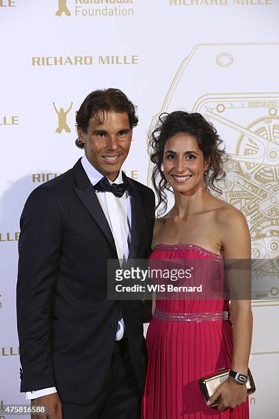 Rafael Nadal with his fiancee Maria Francisca Perello pose at the 1st Gala of his foundation Fudacion Rafa Nadal on may 23, 2015 in Paris, France.