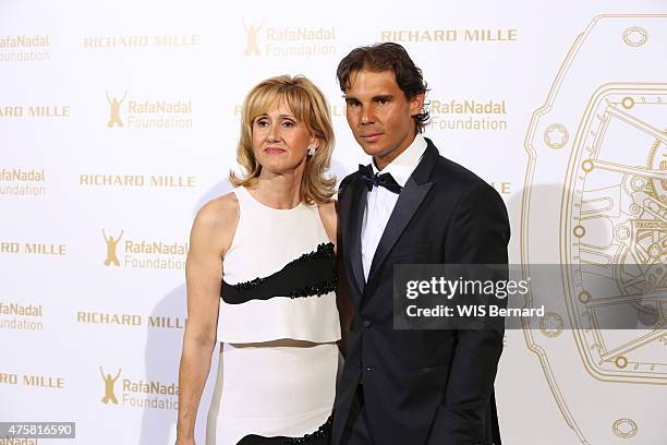 Rafael Nadal with his mother Ana Maria Parera pose at the 1st Gala of his foundation Fudacion Rafa Nadal on may 23, 2015 in Paris, France.