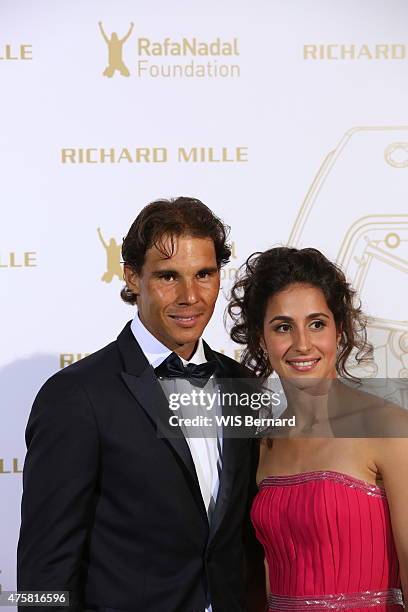 Rafael Nadal with his fiancee Maria Francisca Perello pose at the 1st Gala of his foundation Fudacion Rafa Nadal on may 23, 2015 in Paris, France.