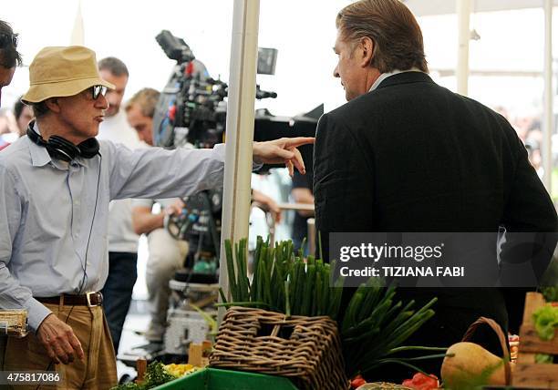 Film director Woody Allen speaks to US actor Alec Baldwin on the set of 'Bop Decameron', the cult filmmaker's latest production, at Campo de' Fiori...