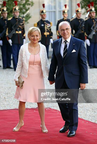 Bernard Cazeneuve and his wife arrive at the State Dinner offered by French President Francois Hollande in honor to the King and Queen of Spain at...