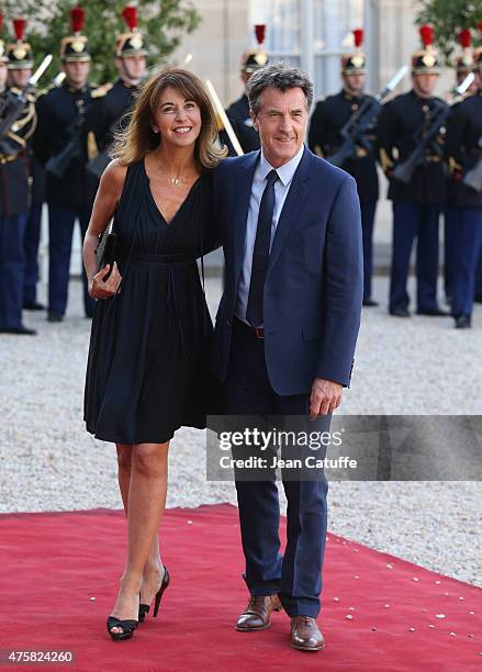 Francois Cluzet and his wife Narjiss Cluzet arrive at the State Dinner offered by French President Francois Hollande in honor to the King and Queen...