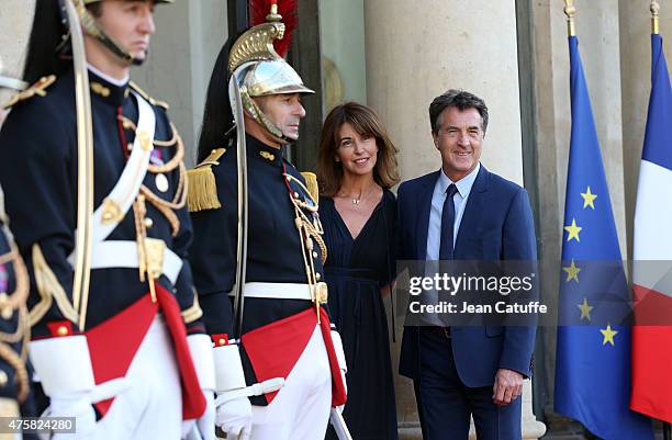Francois Cluzet and his wife Narjiss Cluzet arrive at the State Dinner offered by French President Francois Hollande in honor to the King and Queen...