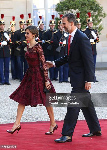 Her Majesty The Queen Letizia of Spain and His Majesty The King Felipe VI of Spain arrive at the State Dinner in their honor at the Elysee Palace on...