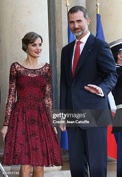 Her Majesty The Queen Letizia of Spain and His Majesty The King Felipe VI of Spain arrive at the State Dinner in their honor at the Elysee Palace on...