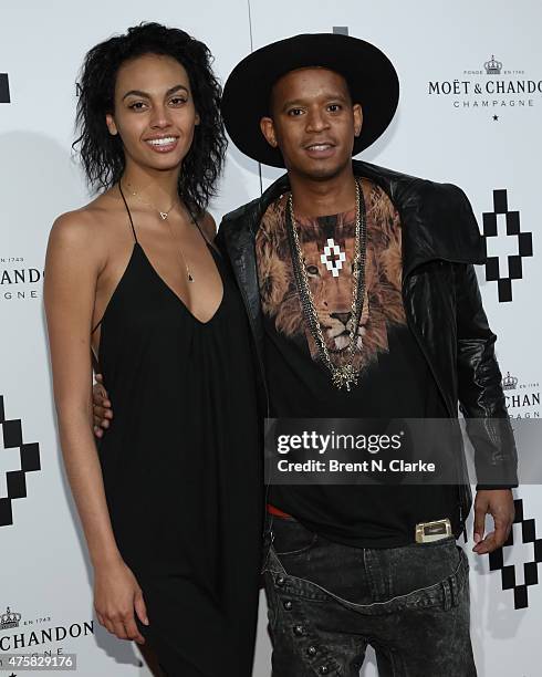 Chef Roble Ali and guest arrive for Moet Nectar Imperial Rose Limited Edition by Marcelo Burlon: The Tiger Bottle Collection Unveiling event held at...