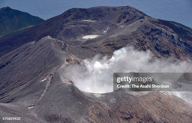 In this aerial image, volcanic smoke continues to rise from Mount Shindake of Kuchinoerabu Island on June 4, 2015 in Yakushima, Kagoshima, Japan....