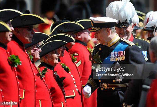 Prince Andrew, Duke Of York, attends the Founder's Day Parade, where the Legion D'Honneur was awarded to Chelsea Pensioners at Royal Hospital Chelsea...