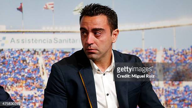 Xavi Hernandez shows his emotions during the 'FC Barcelona Homage to Xavi' ahead of his final game for the club at Camp Nou on June 3, 2015 in...