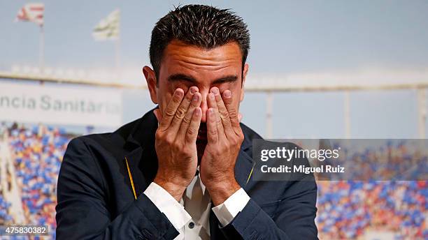 Xavi Hernandez cries during the 'FC Barcelona Homage to Xavi' ahead of his final game for the club at Camp Nou on June 3, 2015 in Barcelona, Spain.