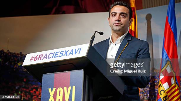 Xavi Hernandez addresses the audience during the 'FC Barcelona Homage to Xavi' ahead of his final game for the club at Camp Nou on June 3, 2015 in...