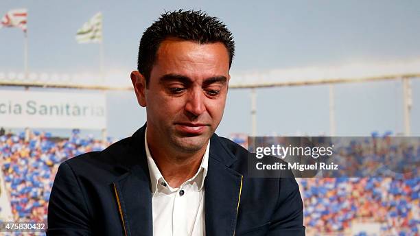 Xavi Hernandez shows his emotions during the 'FC Barcelona Homage to Xavi' ahead of his final game for the club at Camp Nou on June 3, 2015 in...