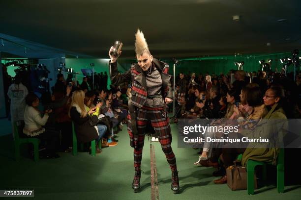 Model walks the runway during the Jean Paul Gaultier show as part of the Paris Fashion Week Womenswear Fall/Winter 2014-2015 on March 1, 2014 in...