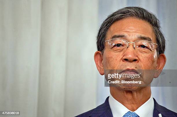 Akira Kiyota, president of Tokyo Stock Exchange Inc., pauses during the opening of the Singapore branch of the Tokyo Stock Exchange Inc. And Osaka...