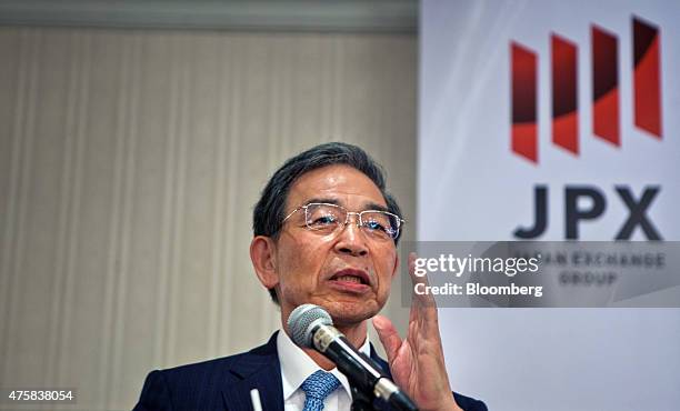 Akira Kiyota, president of Tokyo Stock Exchange Inc., gestures as he speaks at the opening of the Singapore branch of the Tokyo Stock Exchange Inc....