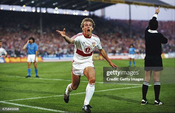 Stuttgart striker Jurgen Klinsmann celebrates after scoring the first Stuttgart goal in the 1989 UEFA Cup Final second leg between VFB Stuttgart and...