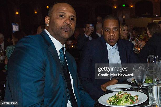 Major League Baseball player CC Sabathia and Jay Z attend the Canoche Benefit for the RC22 Foundation hosted by Robinson Cano at the Paramount...