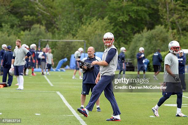 Tom Brady of the New England Patriots, works out during organized team activities at Gillette Stadium on June 4, 2015 in Foxborough, Massachusetts.
