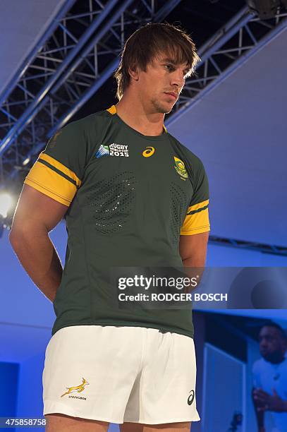Eben Etzebeth, number 4 lock of South Africa's national rugby union team the Springboks, stands at the unveiling of the team's new jersey in Cape...