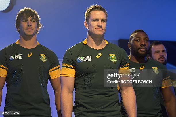 Members of South Africa's national rugby union team the Springboks number 4 lock Eben Etzebeth, captain and inside centre Jean de Villiers and prop...