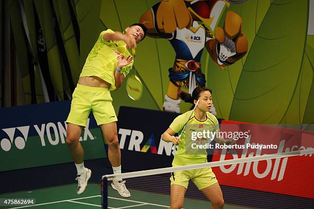 Xu Chen and Ma Jin of China return a shot against Solgyu Choi and Eom Hye Won of Korea during the 2015 BCA Indonesia Open Round 2 match on June 4,...