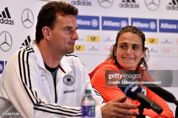 Goalkeeper coach Michael Fuchs and goalkeeper Nadine Angerer of Germany attend a press conference at The Shaw Centre on June 4, 2015 in Ottawa,...