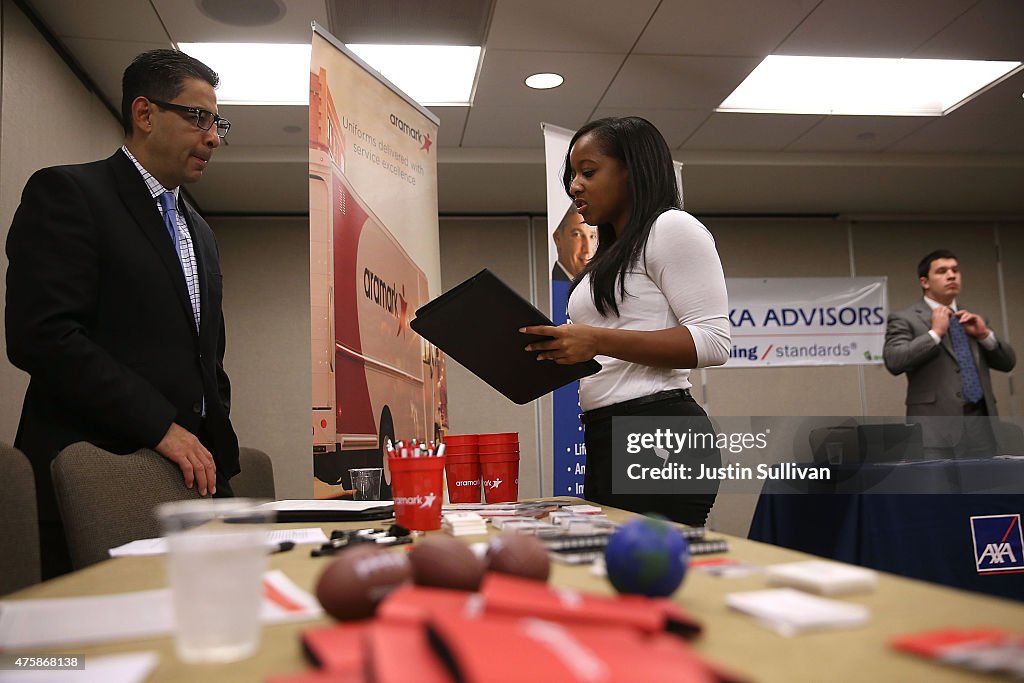 Job Seekers Apply For Open Positions At Career Fair In San Francisco