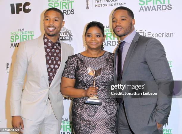 Michael B. Jordan, Octavia Spencer and Director Ryan Coogler pose with the Best First Feature Award for 'Fruitvale Station' in the press room during...