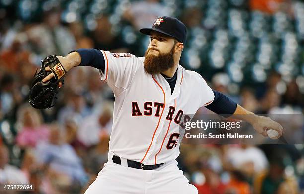 Dallas Keuchel of the Houston Astros throws a pitch in the third inning during their game against the Baltimore Orioles at Minute Maid Park on June...