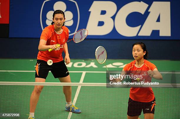 Ma Jin and Tang Yuanting of China return a shot against Yoo Jung Chae and Kim So Yeong of Korea during the 2015 BCA Indonesia Open Round 2 match on...