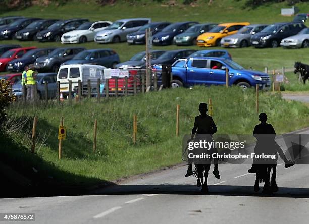 Travellers race their horses along the 'Mad Mile' during the Appleby Horse Fair on June 4, 2015 in Appleby, England. The Appleby Horse Fair has...