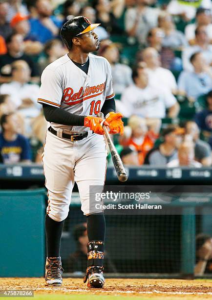 Adam Jones of the Baltimore Orioles connects on a solo home run in the eighth inning during their game against the Houston Astros at Minute Maid Park...