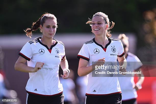 Sara Daebritz and Melanie Leupolz of Germany practice during a training session at Richcraft Recreation Complex on June 4, 2015 in Ottawa, Canada.