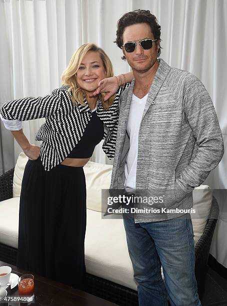 Actress and co-founder of Fabletics, Kate Hudson and actor Oliver Hudson attend the FL2 Launch on June 4, 2015 in New York City.