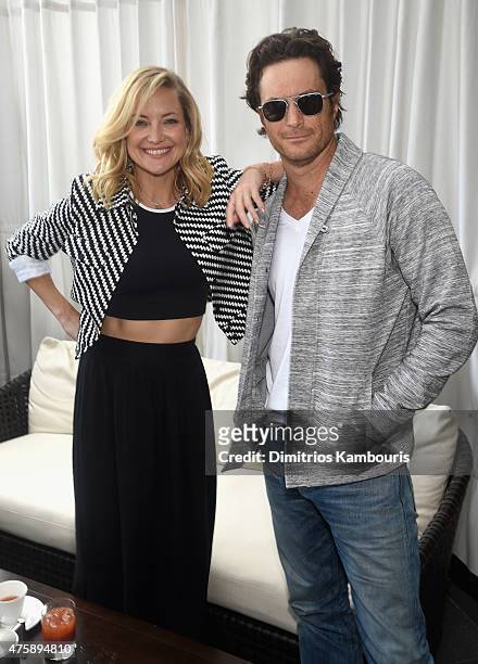 Actress and co-founder of Fabletics, Kate Hudson and actor Oliver Hudson attend the FL2 Launch on June 4, 2015 in New York City.