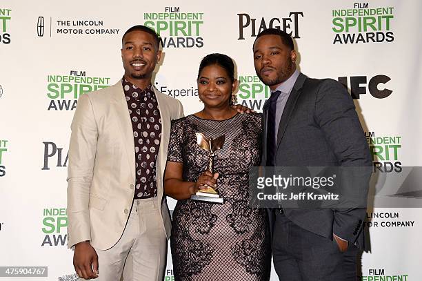 Actor Michael B. Jordan, actress Octavia Spencer and director Ryan Coogler pose with the award for Best First Feature for "Fruitvale Station" in the...