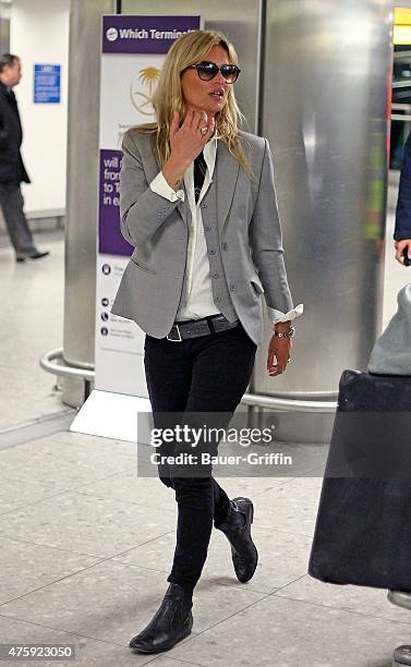 Kate Moss is seen at Heathrow airport on January 11, 2011 in London, United Kingdom.