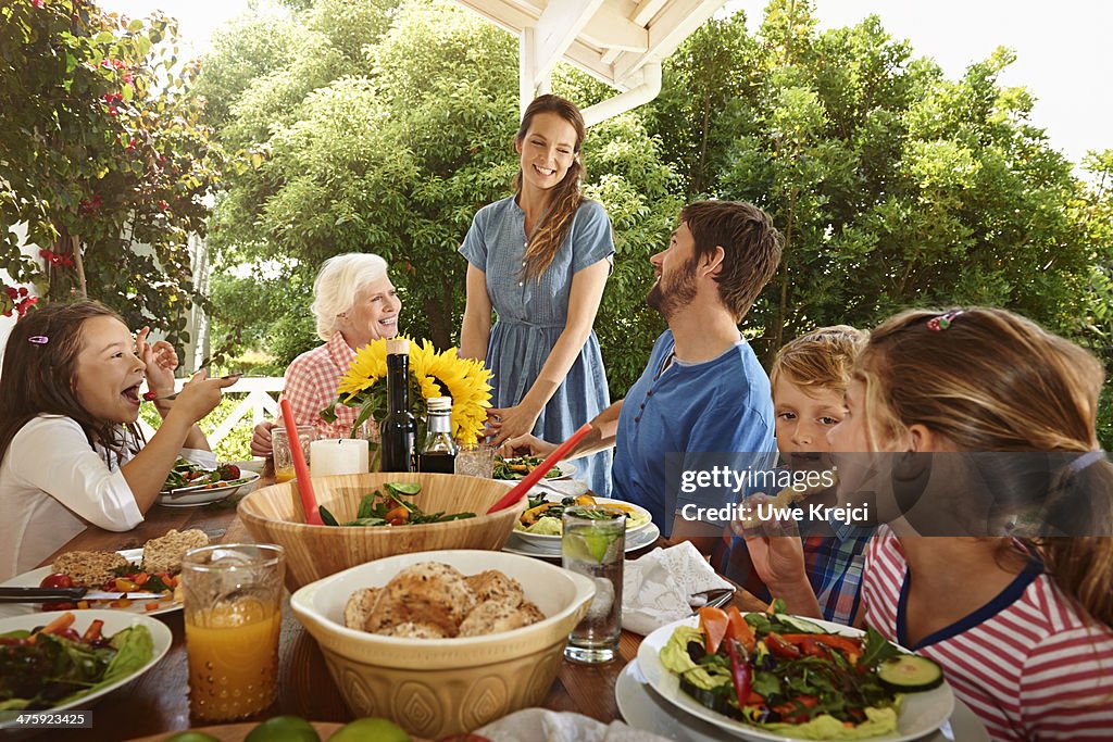 Family meal, outdoors
