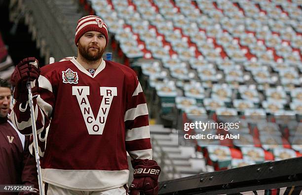 Zack Kassian of the Vancouver Canucks walks into the practice for the 2014 Tim Horton NHL Heritage Classic between the Vancouver Canucks and Ottawa...