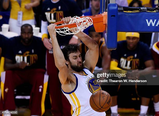 Andrew Bogut of the Golden State Warriors dunks against the Cleveland Cavaliers in the fourth quarter during Game One of the 2015 NBA Finals at...