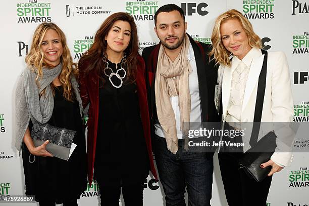 Director Jehane Noujaim and producer Karim Amer attend the 2014 Film Independent Spirit Awards at Santa Monica Beach on March 1, 2014 in Santa...