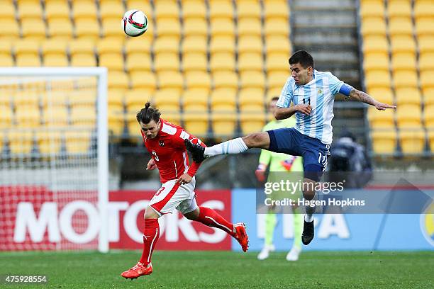 Daniel Rosenbichler of Austria and Angel Correa of Argentina compete for the ball during the FIFA U-20 World Cup New Zealand 2015 Group B match...