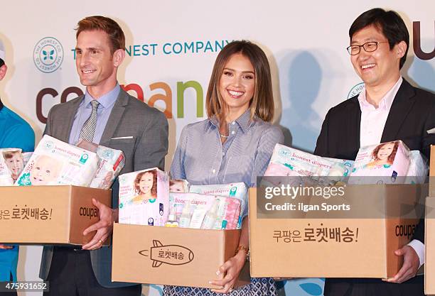 Christopher Gavigan, Jessica Alba and Kim Bum-Suk pose for photographs during 'Honest Company' launching event with Coupang at Grand Intercontinental...