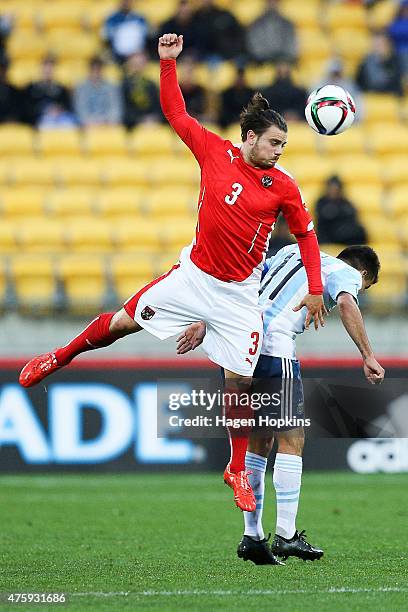 Daniel Rosenbichler of Austria wins a header over Angel Correa of Argentina during the FIFA U-20 World Cup New Zealand 2015 Group B match between...