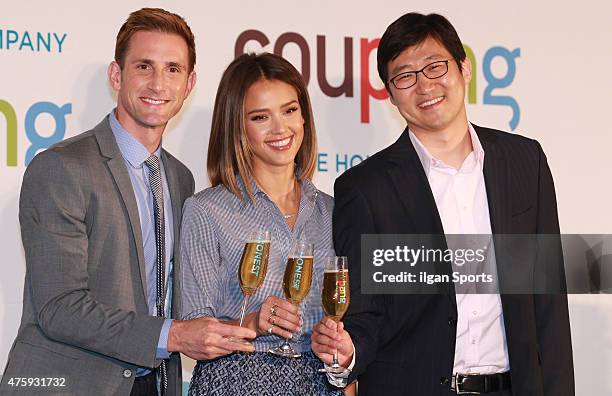 Christopher Gavigan, Jessica Alba and Kim Bum-Suk pose for photographs during 'Honest Company' launching event with Coupang at Grand Intercontinental...