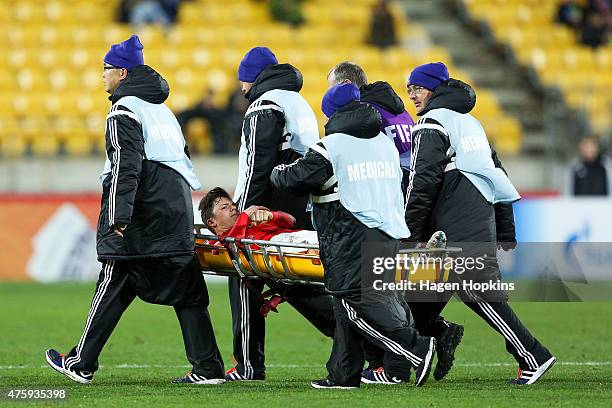 Martin Rasner of Austria is stretchered from the field after sustaining an injury during the FIFA U-20 World Cup New Zealand 2015 Group B match...