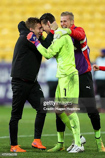 Valentin Grubeck, Tino Casali and Johannes Kreidl of Austria celebrate at the after the final whistle during the FIFA U-20 World Cup New Zealand 2015...